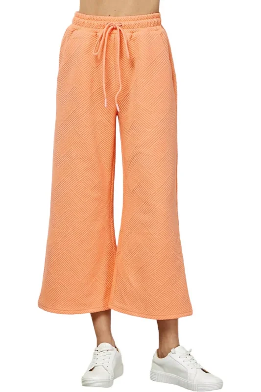 Minimalist Women’s Fashion Clothing Textured Soft Cropped Wide Pants In Peach